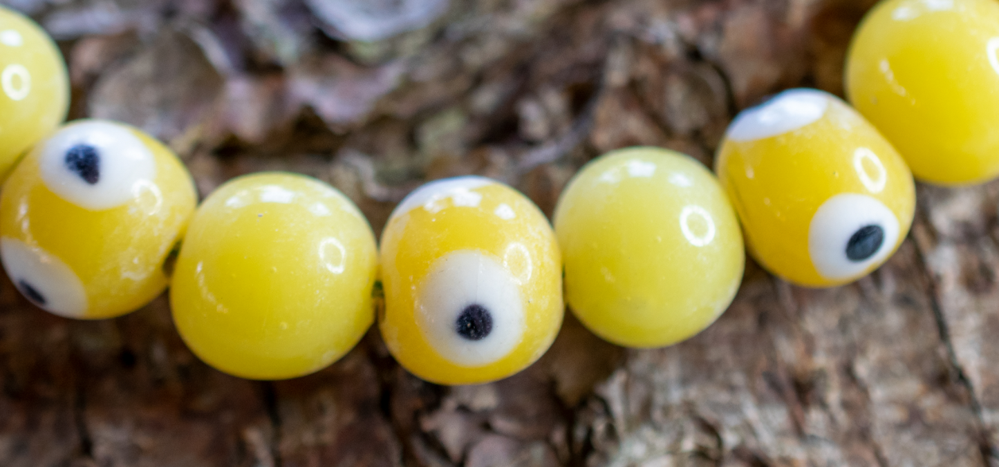 20 Handgearbeitete Muranoglas Augenperlen in verschiedenen Farben und Stärken