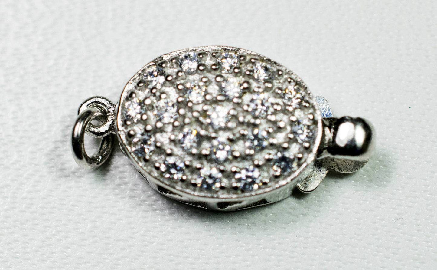Schmuckschließe Oval mit Swarovskikristallen aus 925-Silber